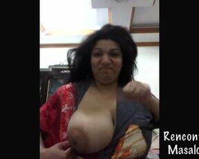 Mature and deaf Arab milf shows her big tits